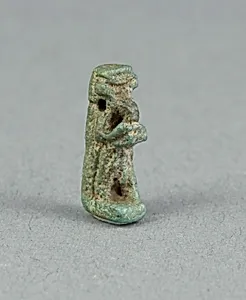 Amulet of the God Thoth Holding an Offering Table (?) by Ancient Egyptian