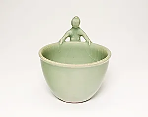 Bowl with Boy and Swimming Fish by Unknown