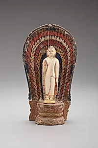 Buddha Standing with Hand in the Gesture of Reassurance (Abhayamudra) with Radiating Nimbus by Unknown