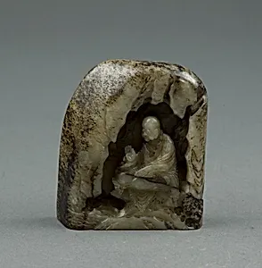 Buddhist Monk in a Grotto 乾隆御题诗玉山子 by Unknown