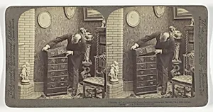 "Building up" an Underwood Patent Extension Stereograph Cabinet, - in a home Library.