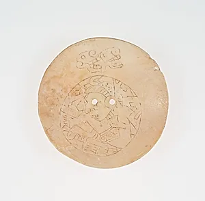 Disc from an Earflare Inscied with a Figure in Contoured Pose