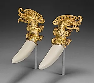Double Pendant in the Form of a Mythical Saurian with Tusks
