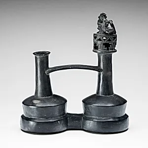 Double Vessel with a Foot-Massage Scene