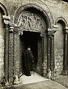 Ely Cathedral: Prior's Door, with Bedesman by Frederick H. Evans