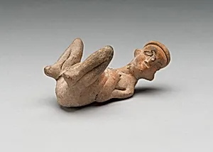Female Figure Giving Birth