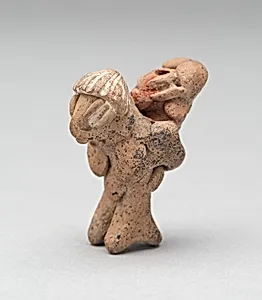 Figurine Depicting a Female Carrying a Child