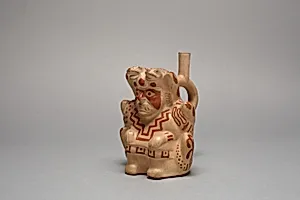 Handle Spout Vessel in the Form of Stitting Figure, Possibly Ai-Apec by Moche