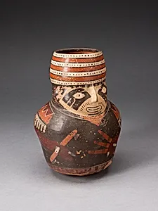 Jar in the Form of a Warrior Holding a Club and Other Weapons by Nasca