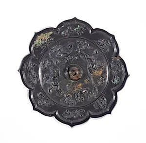 Lobed Mirror with Birds, Lions, and Floral Sprays by Unknown