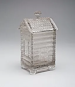 "Log Cabin" pattern marmalade covered jar