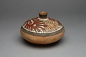 Low Jar with Small Spout Depicting a Repeated Abstract Star or Face Motif by Nasca