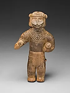 Masked Figurine Holding a Drum, Possibly an Ocarina (Whistle)