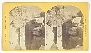 The northern wall of the Grand Cañon of the Colorado, near the foot of To-ro-weap valley. The rounded rocks of the foreground are sand-stone, No. 14 from the series "Geographical Explorations and Surveys West of the 100th Meridian"