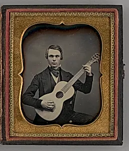 Untitled (Portrait of a Man Holding a Guitar) by Unknown