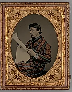 Untitled (Portrait of a Man Reading with Smoking Coat and Pipe) by Unknown Maker