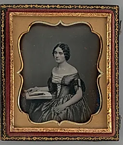 Untitled (Portrait of Seated Woman with Book) by Unknown Maker