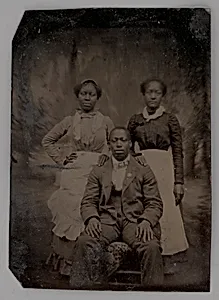 Untitled (Portrait of Two Standing Women and One Seated Man) by Unknown Maker
