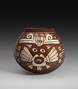 Vessel Depicting a Costumed Ritual Performer Holding a Staff and a Trophy Head by Nasca