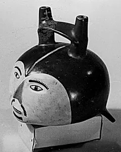 Vessel in the Form of a Severed Trophy Head by Nasca