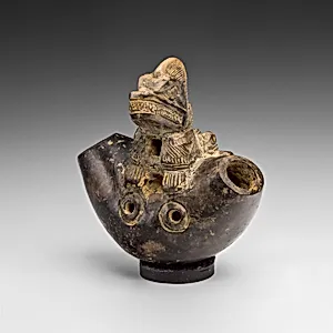 Whistle with an Iguana or Saurian Sculpted on its Surface
