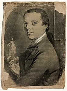 Young Man Holding Statuette