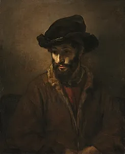 A Bearded Man Wearing a Hat