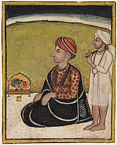 A Ruler Seated on a Terrace Worshipping at a Shrine of Radha and Krishna by Unknown Artist