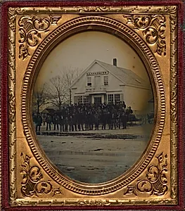 Crowd with sleigh in front of LL & ER Smith store by Unknown Artist