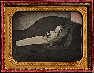 Dead Child On a Sofa by Unknown Artist