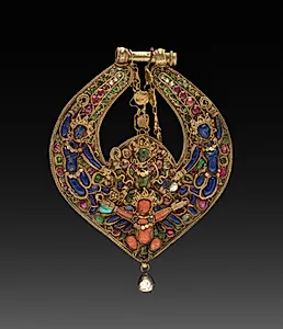 Deity Earring with Vishnu on Garuda (front) and chepu (monster mask) (back) by Unknown Artist