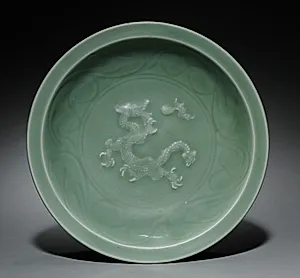 Dish with Dragon Pursuing Flaming Jewel in Relief:  Longquan Ware by Unknown Artist