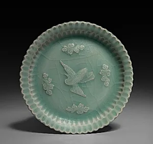 Dish with Flying Crane and Clouds in Relief by Unknown Artist