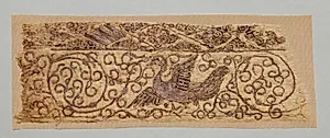 Embroidered fragment with bird among vines by Unknown Artist