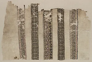 Fragment Composed of Parts of Three Tiraz-Style Textiles by Unknown Artist