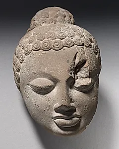 Fragment of Head of Buddha by Unknown Artist