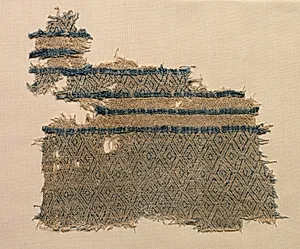 Fragment of linen damask with diamond designs in bands by Unknown Artist