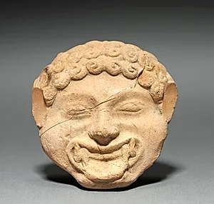 Gorgoneion Plaque with Incised Figure of a Dancing Satyr by Unknown Artist