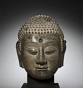 Head of Buddha by Unknown Artist