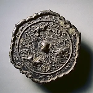 Hexafoil Mirror with Floral Interlaces, a Phoenix, and Running Animals by Unknown Artist