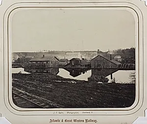 Industrial Buildings (Reflected in Erie Canal, Meadville?) by James Fitzallen Ryder (American, 1826–1904)