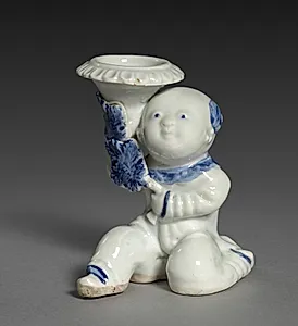 Kneeling Boy Holding a Vase by Unknown Artist