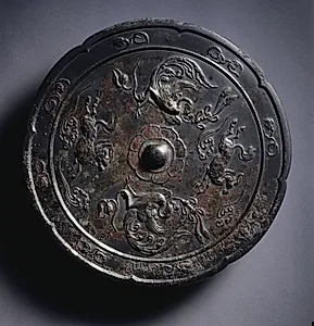 Lobed Mirror with Paired Phoenixes and Auspicious Animals by Unknown Artist