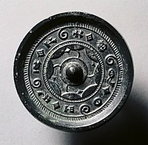 Mirror with Concentric Circles and Linked Arcs
 by Unknown Artist