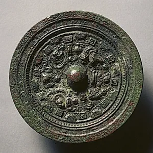 Mirror with Deities and Animals Surrounded by Rings of Squares and Semicircles by Unknown Artist