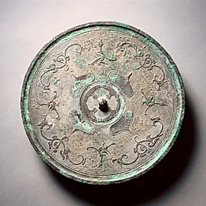 Mirror with Double Quatrefoils, Dragons, and Phoenixes by Unknown Artist