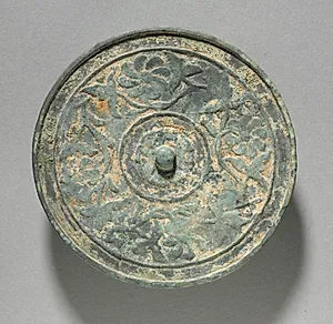 Mirror with Scroll Design by Unknown Artist