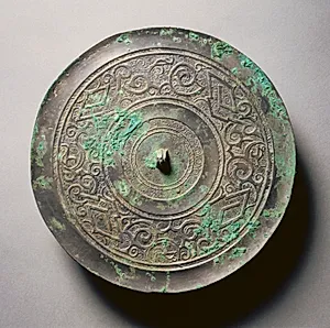 Mirror with Serpentine Interlaces and Angular Meanders by Unknown Artist