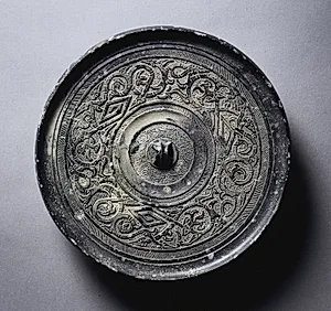 Mirror with Serpentine Interlaces and Angular Meanders by Unknown Artist