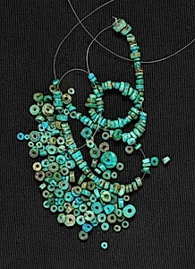 Modern blue beads removed from Necklace by Unknown Artist